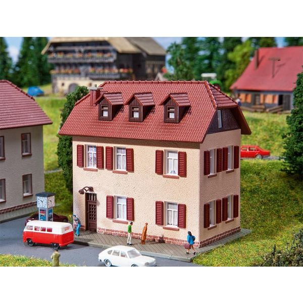 Faller - Two-storey home with shutters