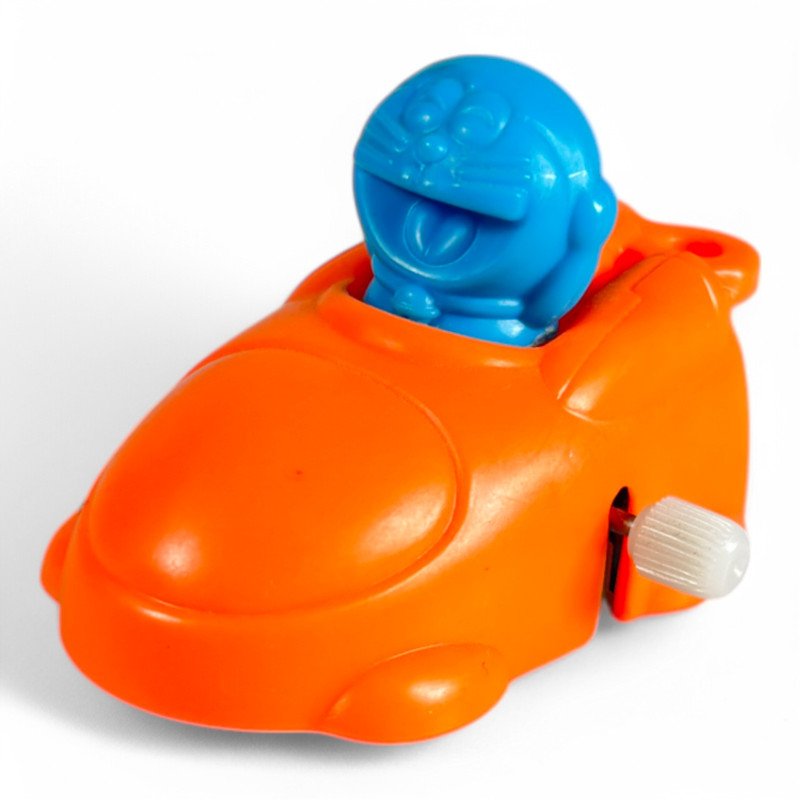 Doraemon: Nobita's Screw-wound City Adventure Orange Toho Mini-dora Screw-wound City Car Movie Promo Wind-up Toy